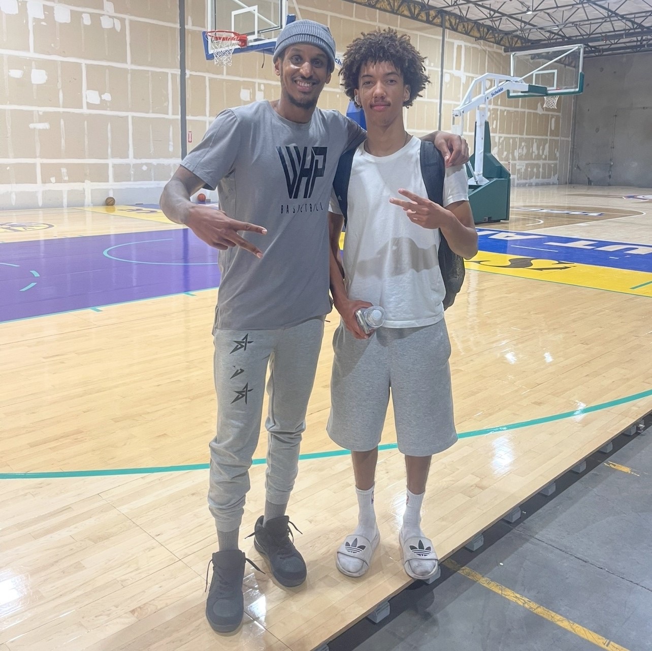 A WE coach and player after a session